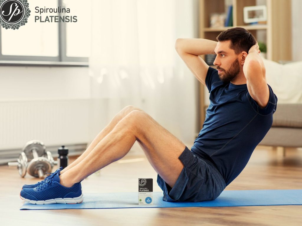 man making abdominal exercises at home site