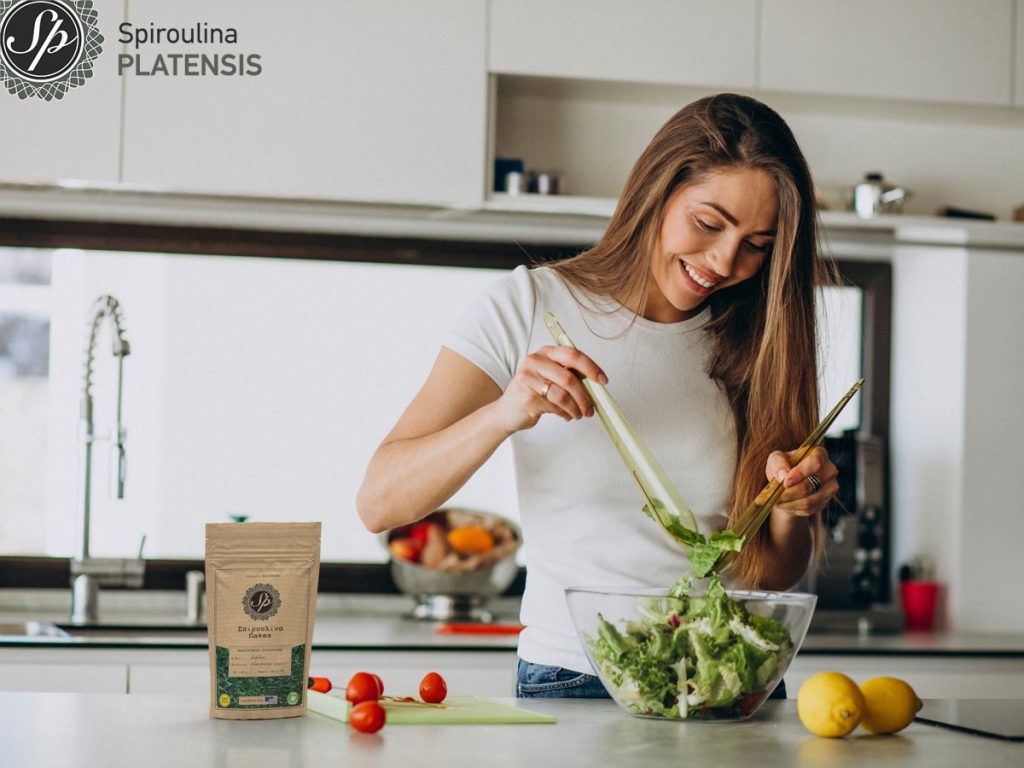5 tips for healthy eating! young woman making salad kitchen site