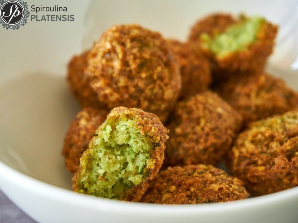 Zucchini balls with Spiroulina flakes zucchini balls spiroulina platensis natural product greek product