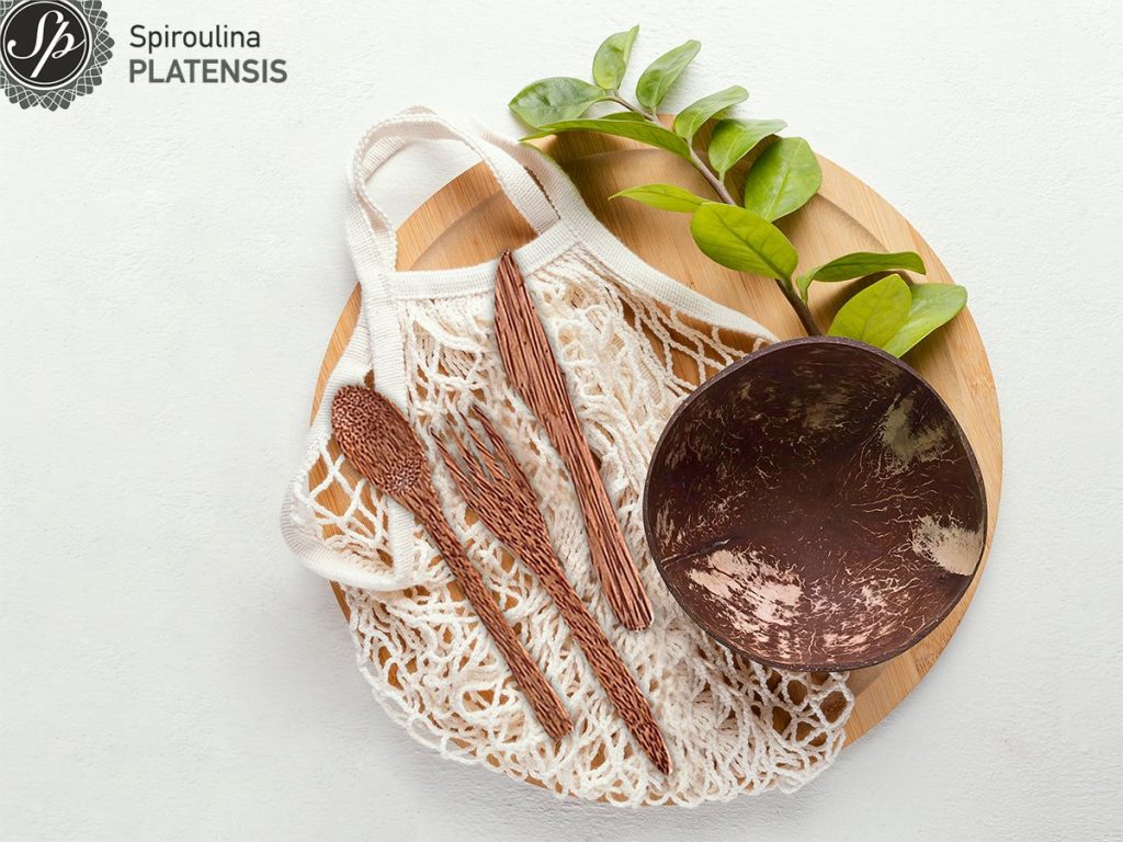 wooden board with cutlery sustainable living spiroulina platensis
