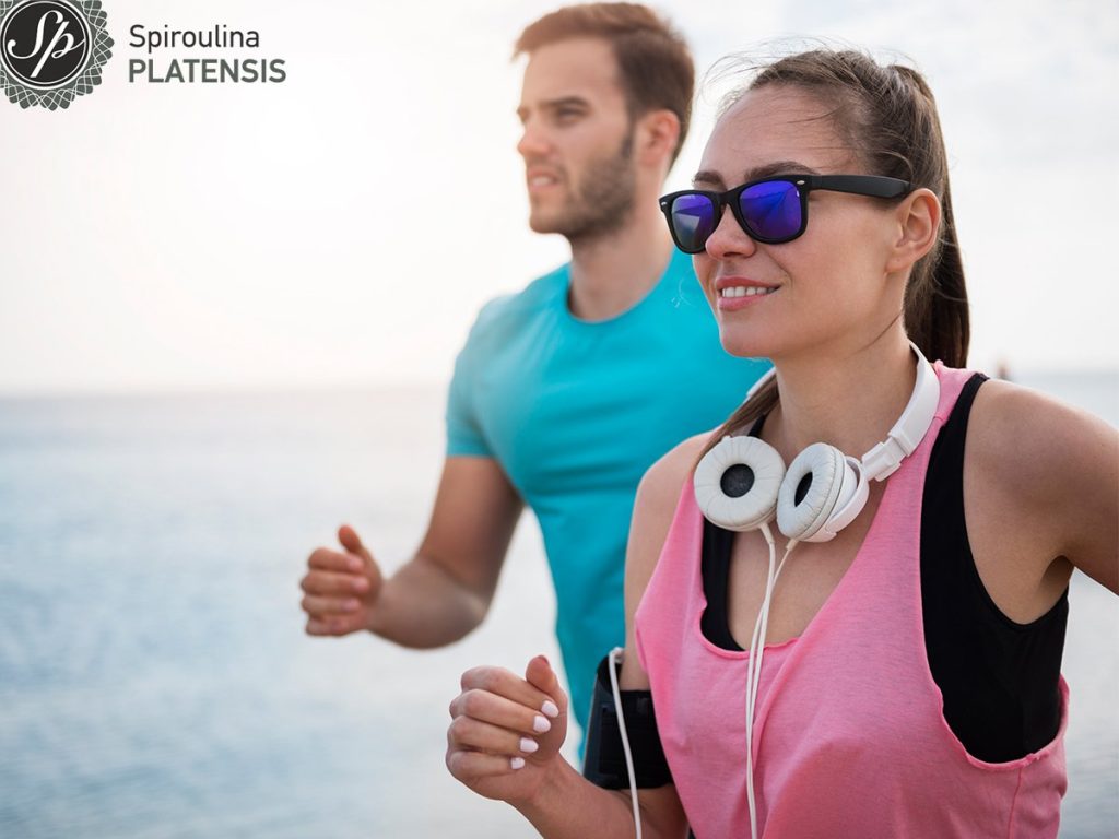 5 habits for immediate weight loss close up young fit people jogging by sea site