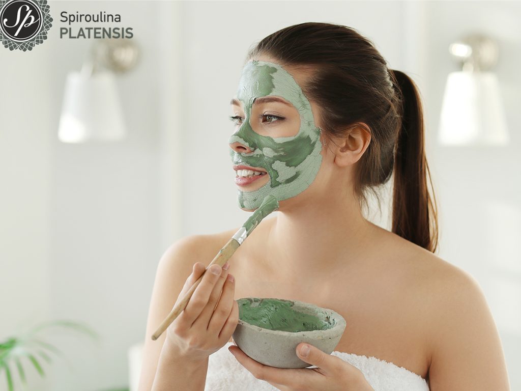 woman with facial mask skin care beauty concept site