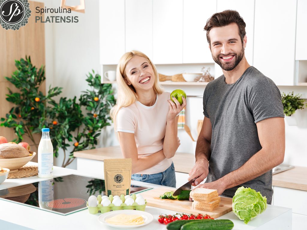 smiling couple spending time together kitchen site