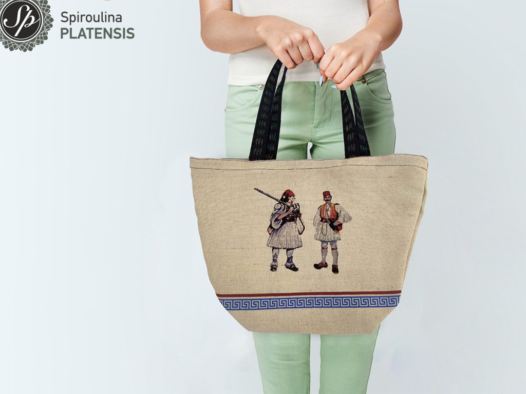 Γιορτάζουμε 200 χρόνια αποκτώντας την Évzones eco bag! evzones eco spiroulina platensis woman with white tote bag site